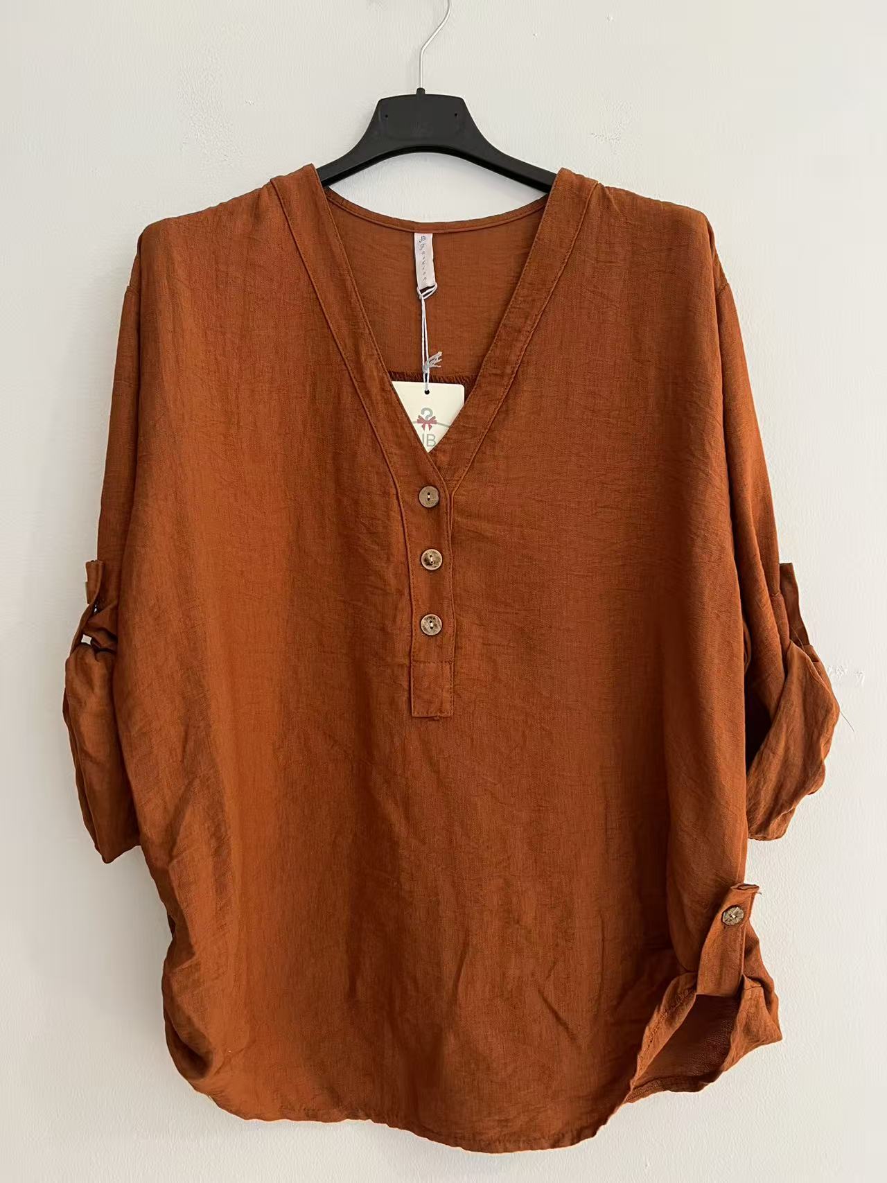 Blusa cuello pico larga caldera