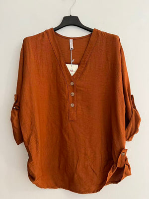 Blusa cuello pico larga caldera