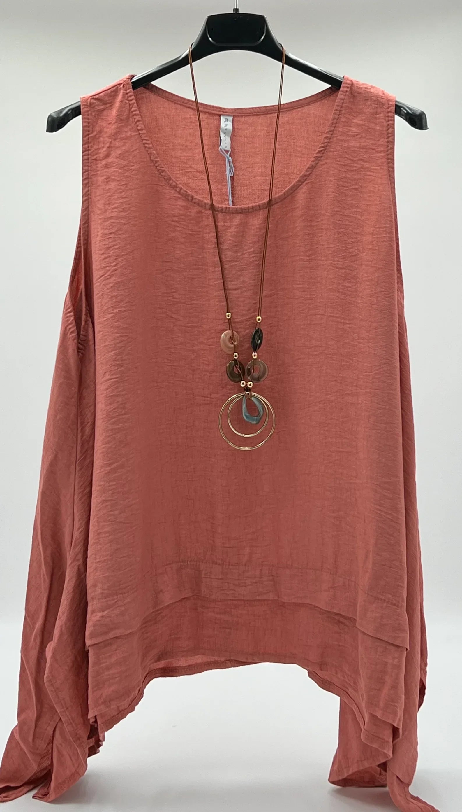 Blusa larga lateral