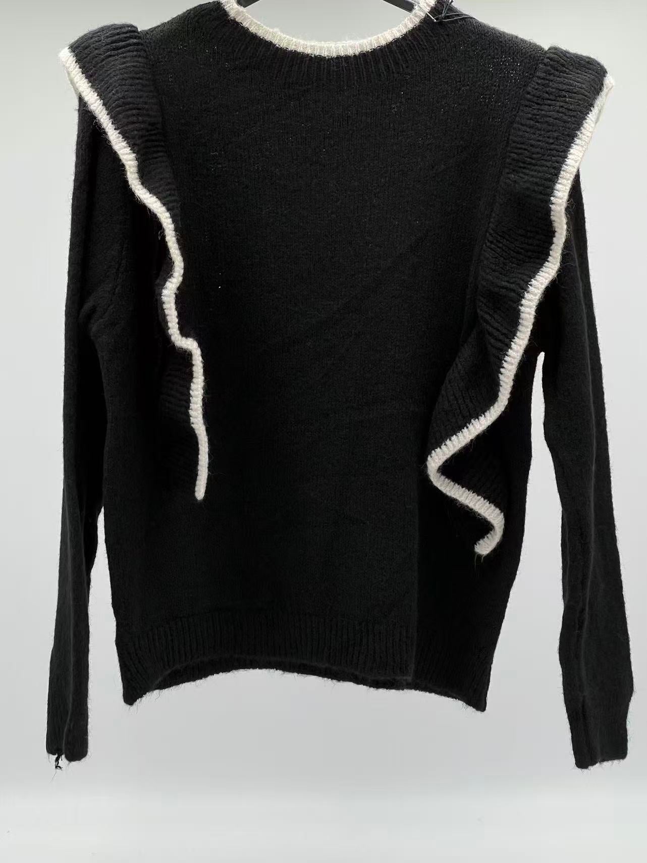 Jersey lana volantes negro