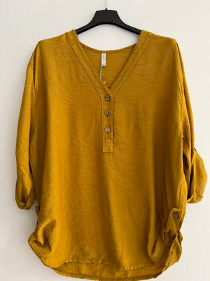 Blusa cuello pico larga mostaza