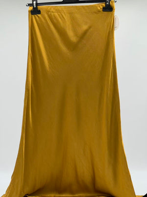 Falda raso larga mostaza