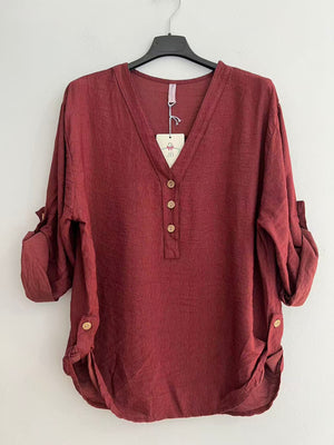 Blusa cuello pico larga burdeos