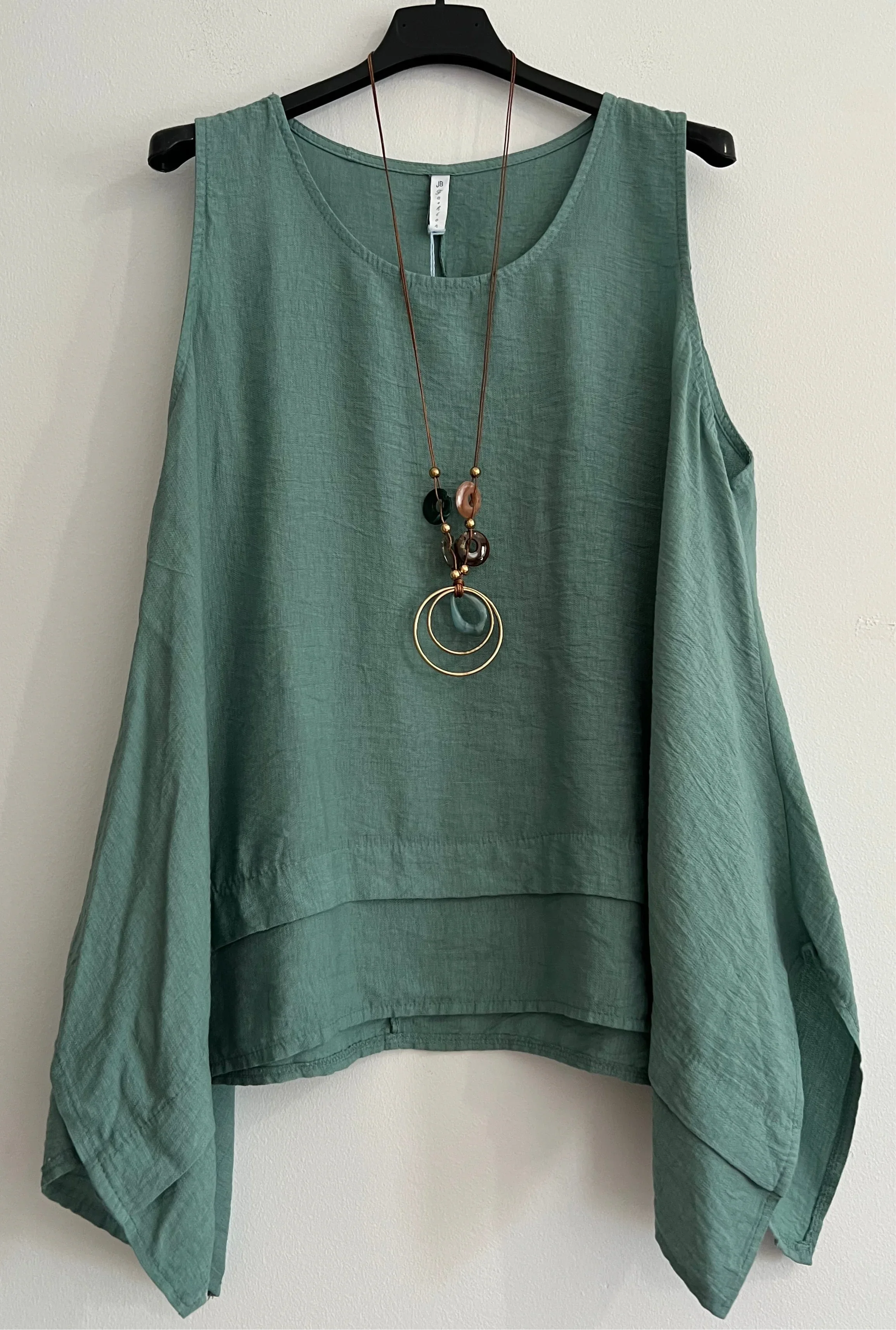 Blusa larga lateral