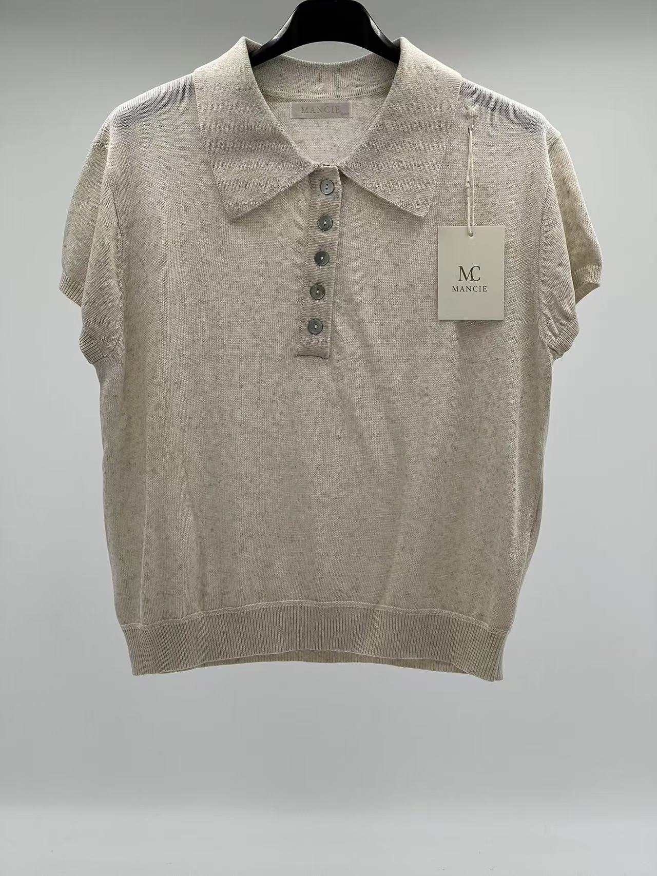 Polo de Punto Fino con Textura Jaspeada Estilo Minimalista Chic