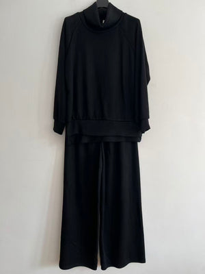 Conjunto de punto mujer cuello alto elegante negro