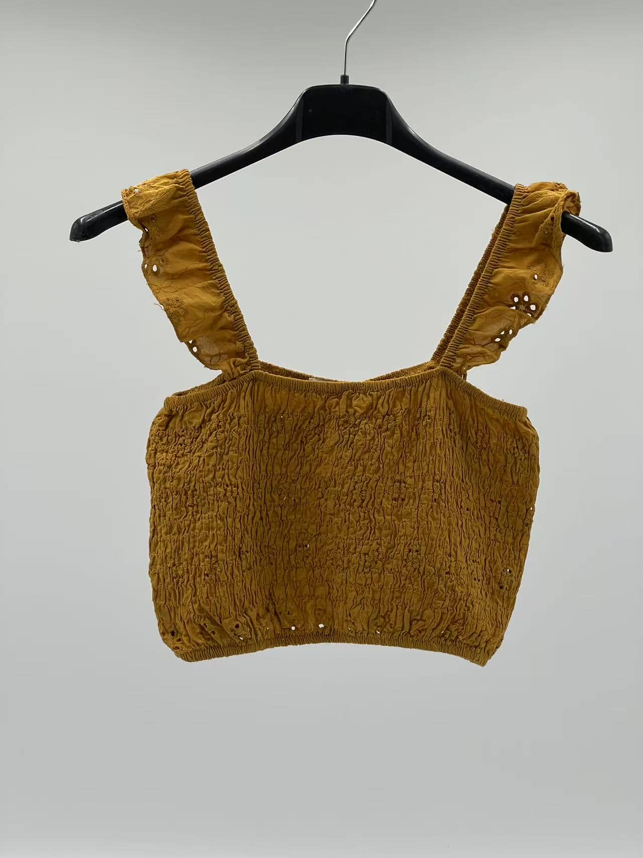 top corto amarillo