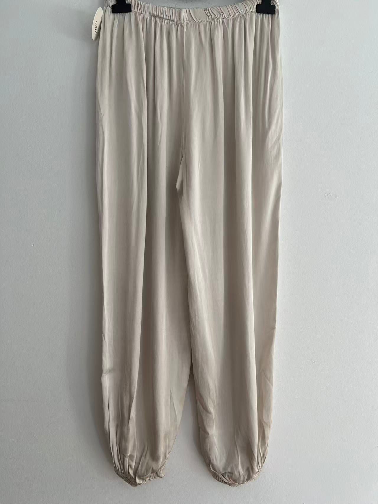 Pantalón largo raso puños beige