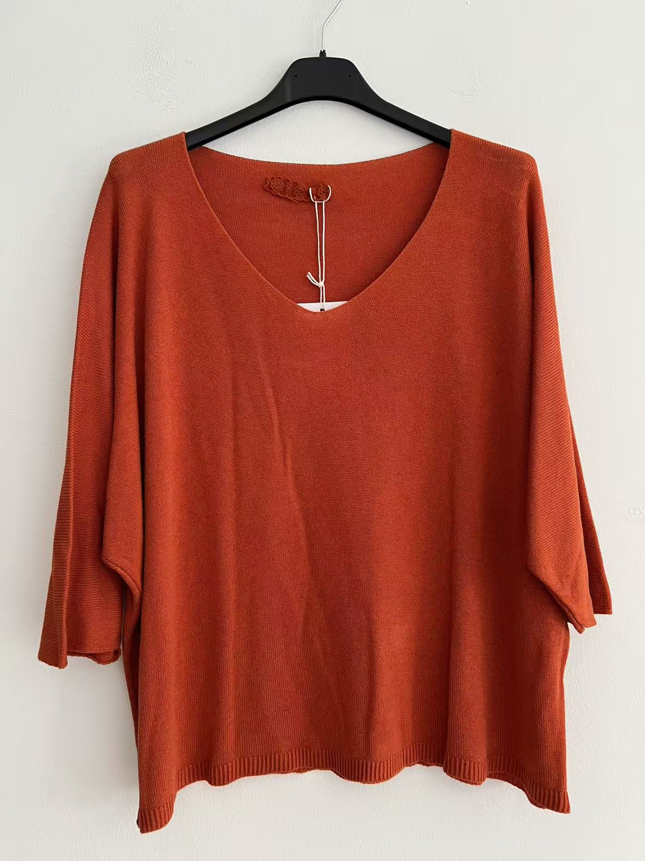 Blusa de puntos coral