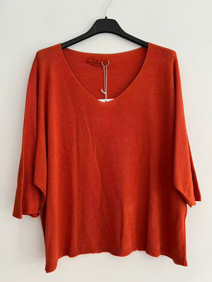 Blusa de puntos coral