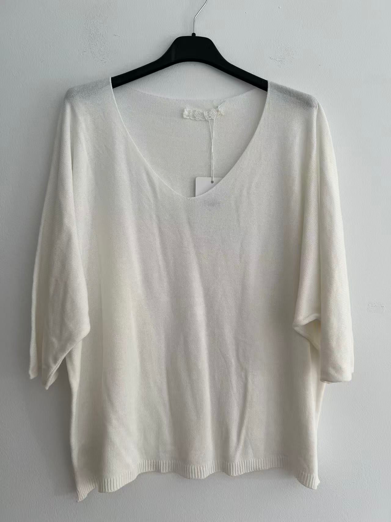 Blusa de puntos blanca