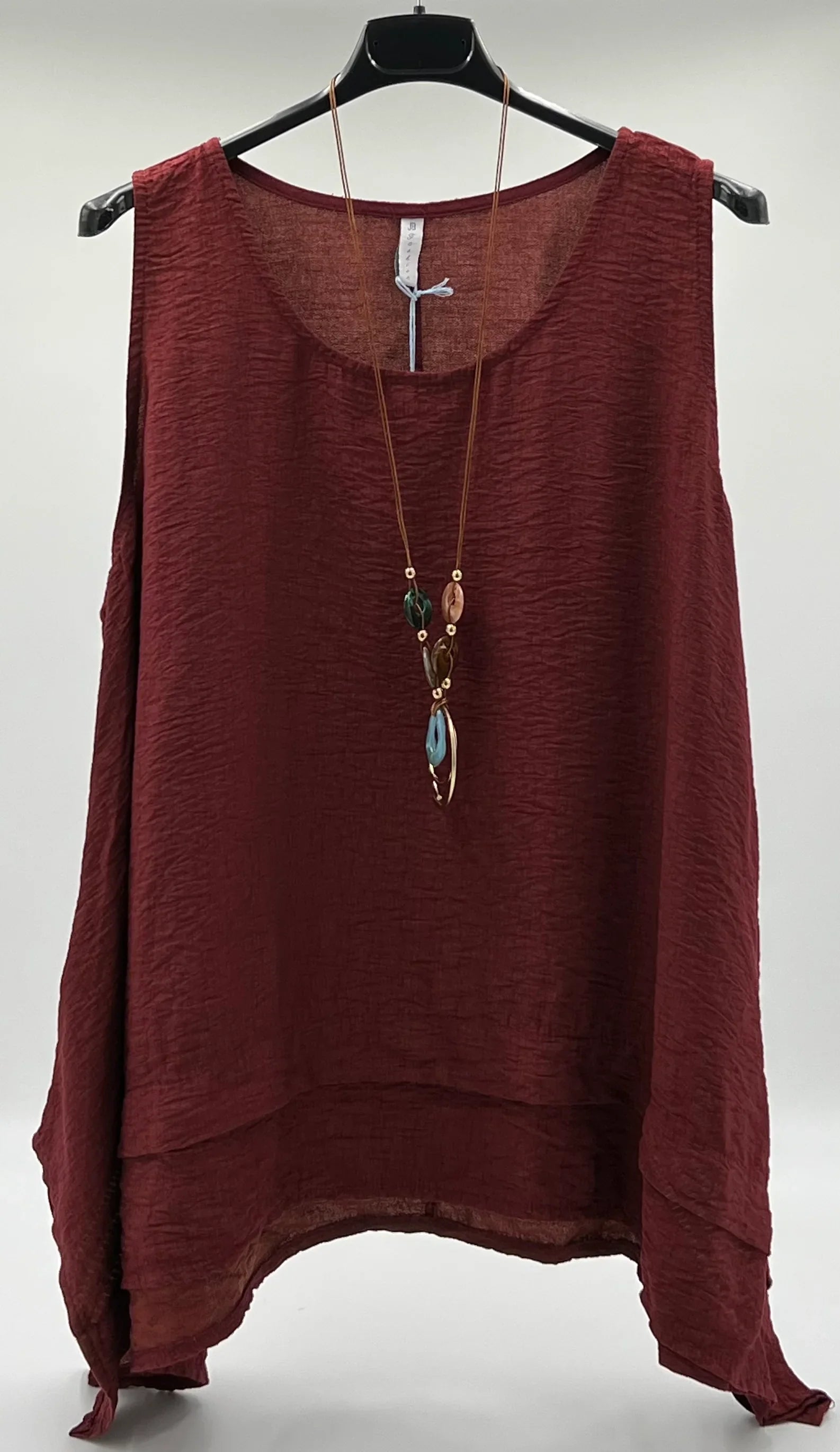 Blusa larga lateral
